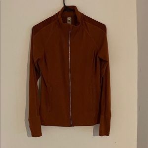 Rust colored workout jacket